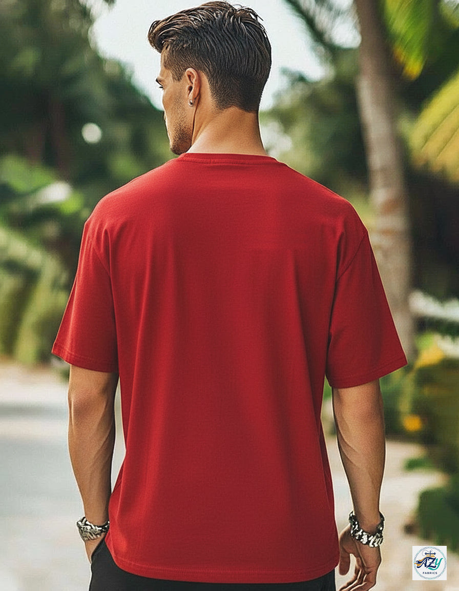 Man wearing a red t-shirt with a blurred natural background #color_Red
